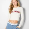 Store Camiseta cropped manga larga print MUJER Varsity